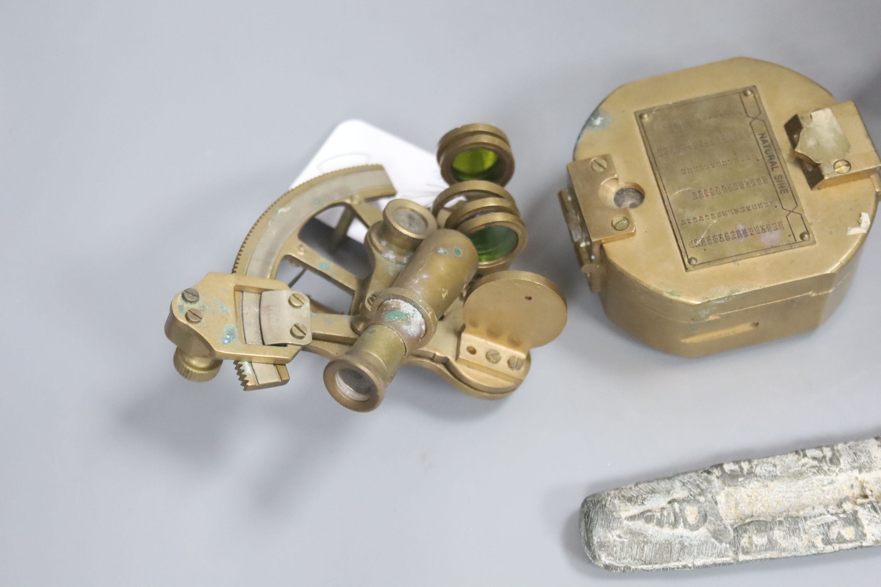 A set of cup weights, a modern level and compass and two other items